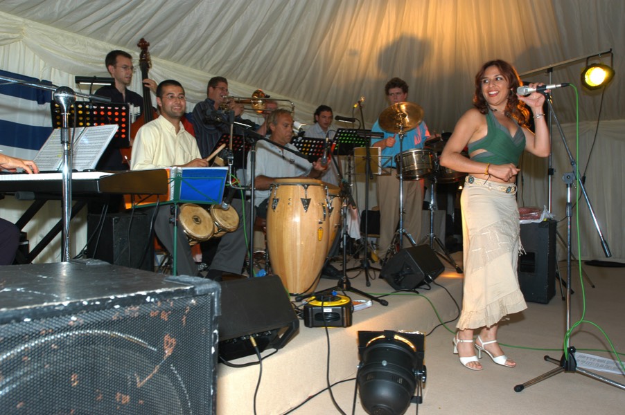 Live salsa band Jan y su Salsa at a corporate party in Gloucestershire, fronted by singer Taide