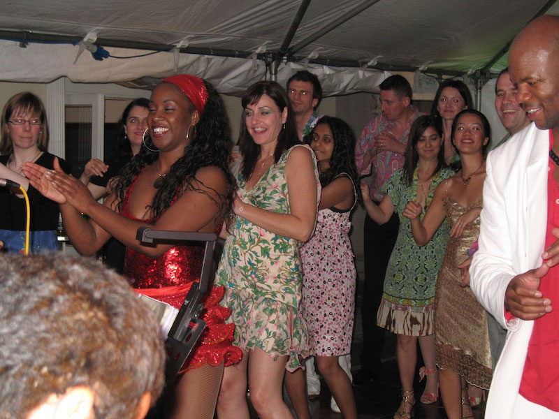 Amanda Demerara, our salsa dancer, demonstrating to guests at a birthday party in Little Venice