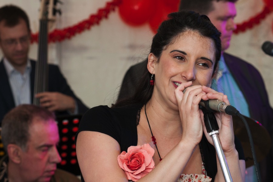 Cuban singer Dunia Correa fronting live latin band Jan y su Salsa at a birthday party in Wiltshire