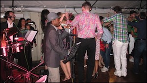 Jan y su Salsa Latin Band performing at a party in Little Venice, London with Cuban singer Enrique